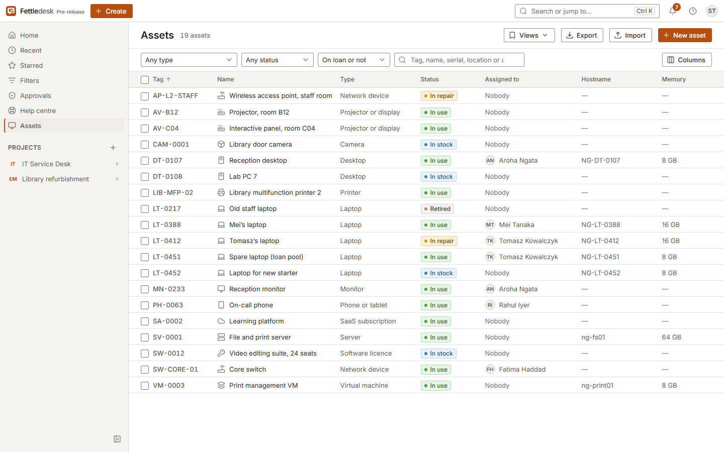 The asset table with chosen columns: type, status, assignee, hostname, memory and warranty end.